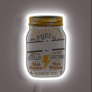 Neon tee featuring bold 'Powered by Pure Moonshine' graphics.