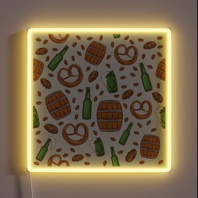 Vibrant neon sign featuring pretzels and beer design.