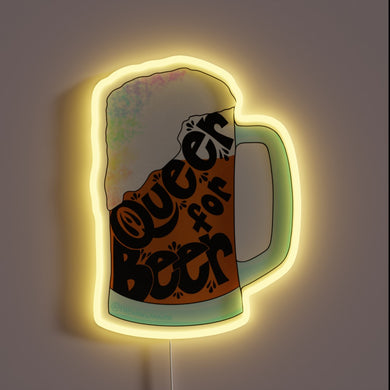 Vintage-inspired Queer for Beer neon sign with colorful RGB accents.