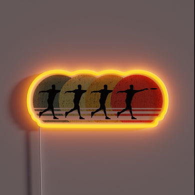 Retro-style RGB neon sign illuminates ultimate frisbee disc golf passion.