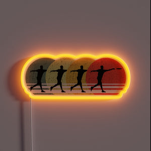 Retro-style RGB neon sign illuminates ultimate frisbee disc golf passion.