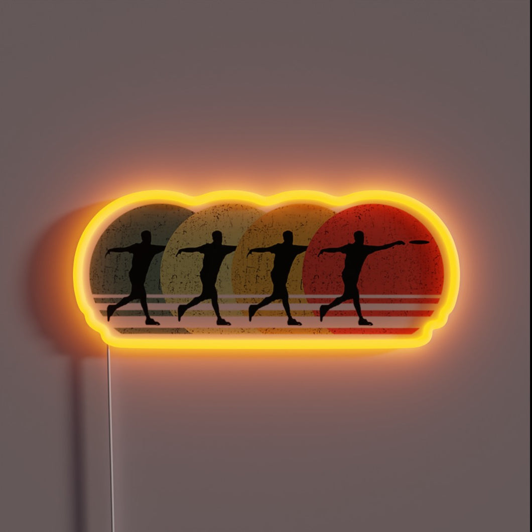 Retro-style RGB neon sign illuminates ultimate frisbee disc golf passion.