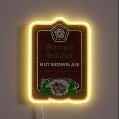 Classic beer branding on a vibrant, colorful, neon RGB sign.