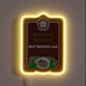 Classic beer branding on a vibrant, colorful, neon RGB sign.