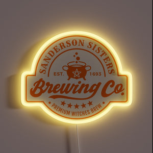 Thanks! This version of the **Sanderson Sisters Brewing Co.** sign has a warm orange glow and a different cauldron design featuring a pentagram, giving it a more mystical and witchy vibe. Perfect for Halloween decor or fans of *Hocus Pocus*!