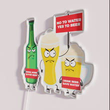 Charger l&#39;image dans la galerie, Water Conservation Awareness Sign with Humorous Twist in Colorful Lighting