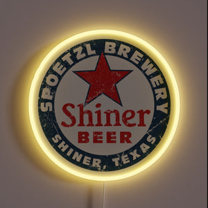 Shiner Beer neon sign with red star.
