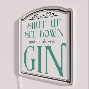 Vibrant RGB neon bar decor with cheeky gin drinking humor.