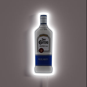 Neon sign shaped like a Jose Cuervo Especial Silver Tequila bottle with white and blue accents and a cool white glow.
