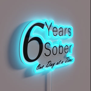 Neon tribute to sobriety milestones, one day at a time.