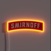 Charger l&#39;image dans la galerie, Neon sign shaped like a red Smirnoff vodka label with bold white text and glowing orange outline.
