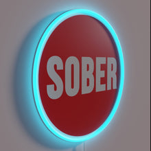 Charger l&#39;image dans la galerie, Sober living support logo illuminated with vibrant RGB neon colors.