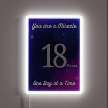 Charger l&#39;image dans la galerie, Neon celebration of 18 years sober in vibrant rainbow colors.