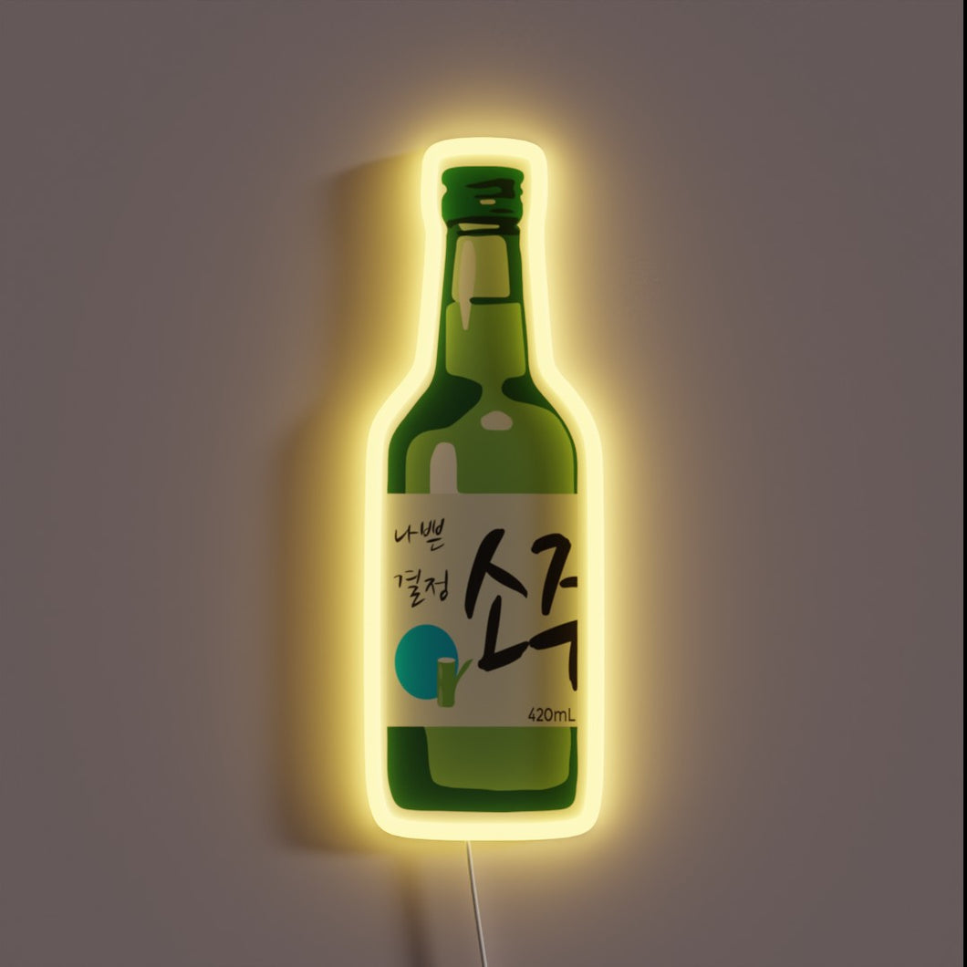 Green soju bottle neon sign with Korean text and a yellow glow.
