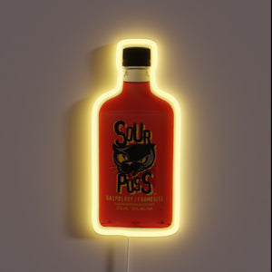 Sour Puss raspberry liqueur bottle neon sign.
