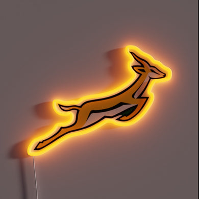 A glowing tribute to speed, agility, and national pride — this Springbok neon sign leaps off the wall with energy. Perfect for rugby fans, South Africans, or anyone who lives fast and bold. 🦌⚡🇿🇦