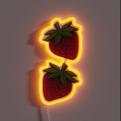 Bright neon strawberry logo in vibrant RGB color scheme glow.