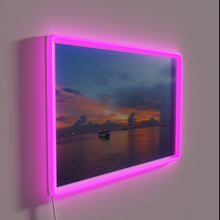 Charger l&#39;image dans la galerie, Vibrant sunset at sea with colorful cruise ships in motion.