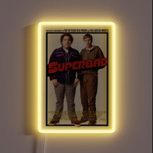 Charger l&#39;image dans la galerie, Bring legendary laughs to your wall with this **Superbad** neon-framed poster. 🍻✨ The ultimate tribute to awkward teenage adventures, iconic one-liners, and unforgettable high school nights. Perfect for movie buffs, man caves, or your next party backdrop.