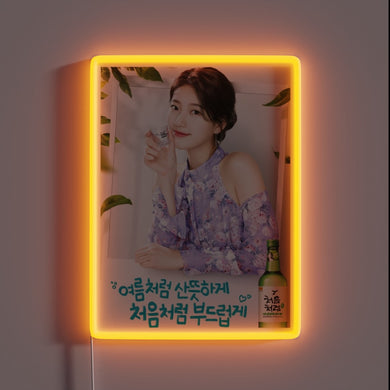 Vibrant Suzy Bae Soju advertisement with colorful RGB neon lighting