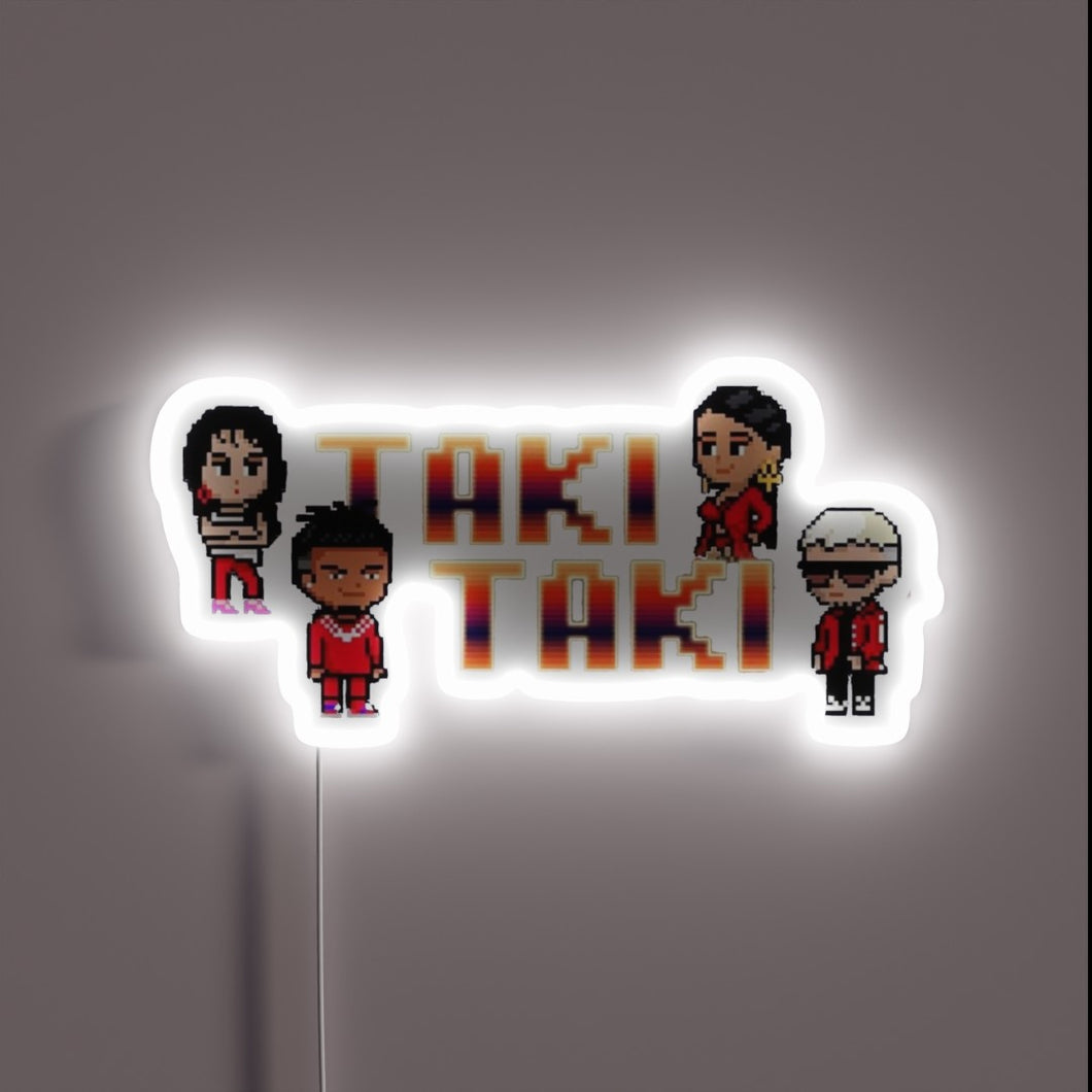 Vibrant Taki Taki logo in colorful RGB neon lighting display.