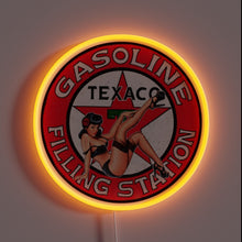 Charger l&#39;image dans la galerie, Texaco vintage neon sign with pin-up girl and red glow.