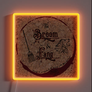 Vintage pub decor with The Broom and Fang logo lighting