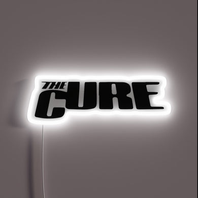 The Cure band neon sign in white glow.