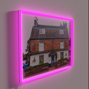 RGB illuminated sign of iconic pub logo, The Queen's Head.