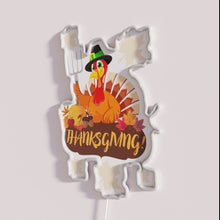 Charger l&#39;image dans la galerie, Vibrant neon thanksgiving decoration with basting oven lamp humor style.