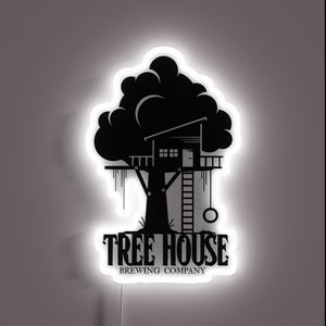 Vibrant RGB illuminated sign featuring the iconic Tree House logo