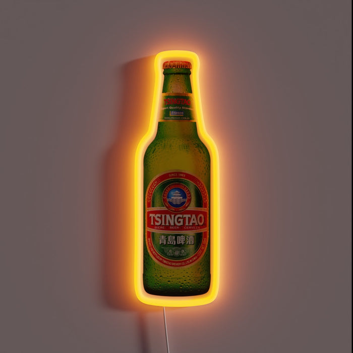 **Alt text:** Neon-lit Tsingtao beer bottle with a glowing orange outline, showing the red and green label with Chinese and English text.
