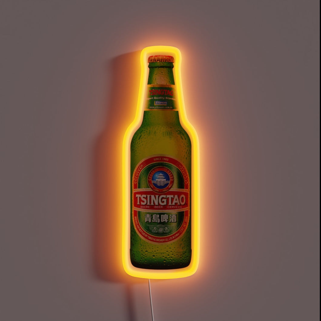 **Alt text:** Neon-lit Tsingtao beer bottle with a glowing orange outline, showing the red and green label with Chinese and English text.
