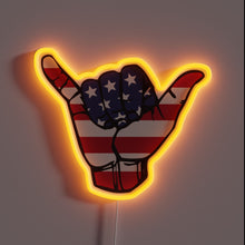 Charger l&#39;image dans la galerie, Patriotic shaka hand gesture with American flag design and orange neon glow.
