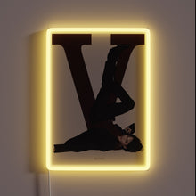 Charger l&#39;image dans la galerie, Vibrant neon sign with customizable RGB colors in a striking V shape.
