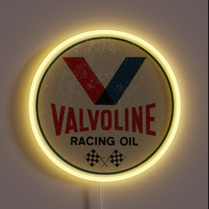 Valvoline racing oil vintage neon sign with yellow glow.