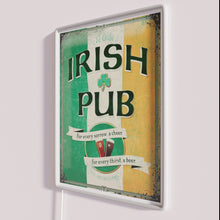 Charger l&#39;image dans la galerie, Retro inspired Irish pub decor with colorful neon lighting accents.