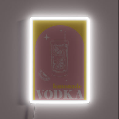 Neon lit bar sign featuring vibrant vodka lemonade design
