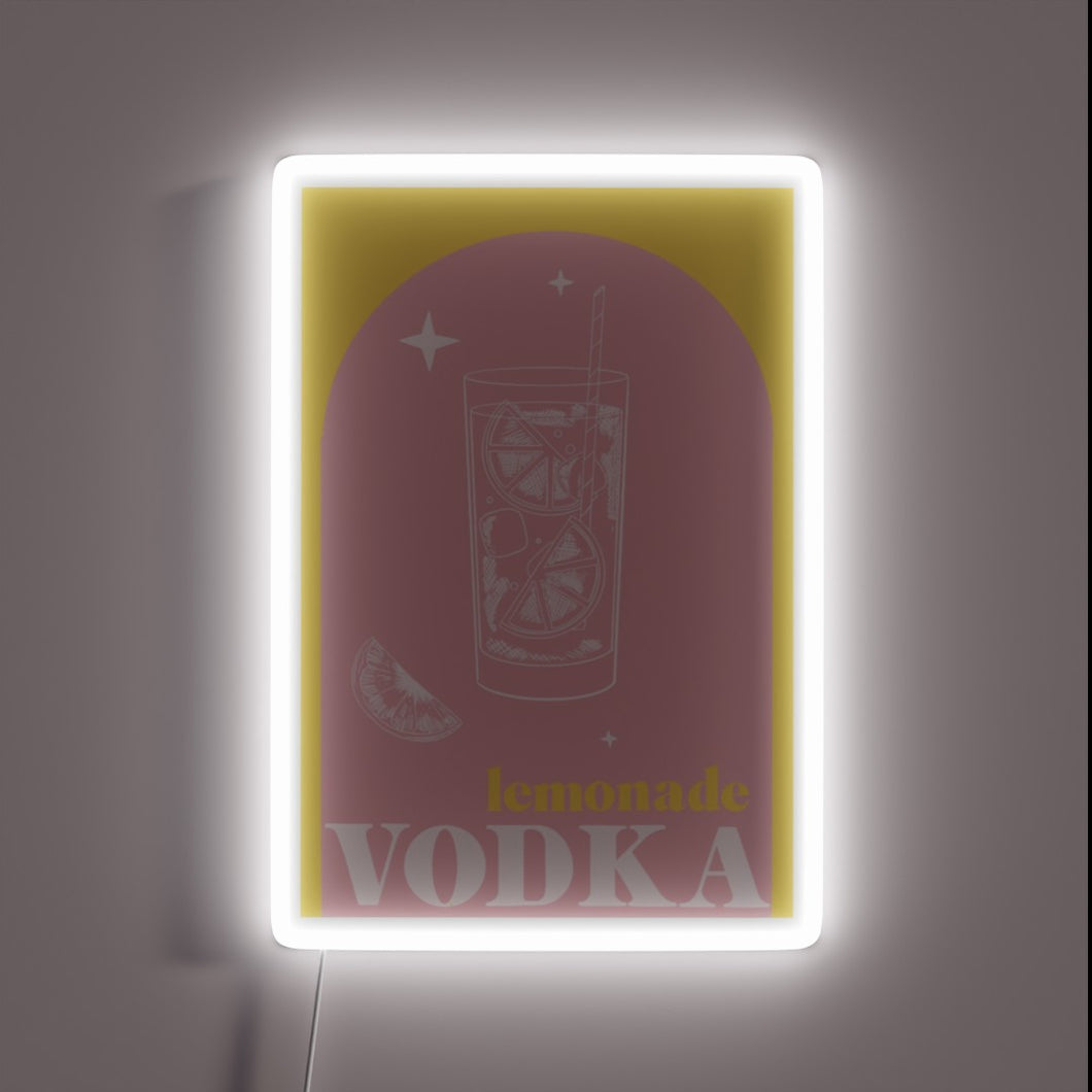Neon lit bar sign featuring vibrant vodka lemonade design