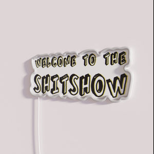 Vibrant RGB neon sign, welcome to the chaos at home.
