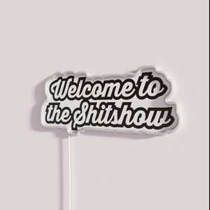 Vibrant Neon Sign Decor for Unconventional Party Atmosphere and Humor