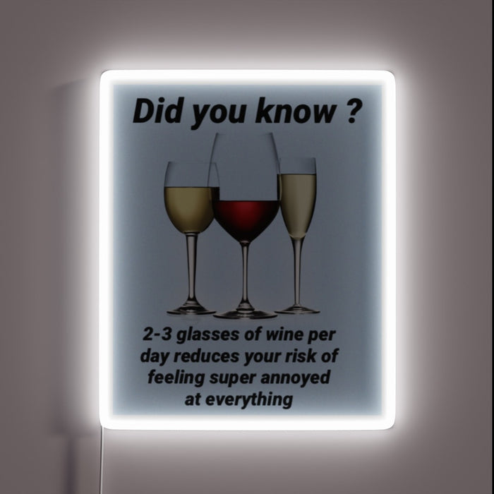 Vibrant Wine Necessity Neon Sign Glows in Bold Colorful Lighting