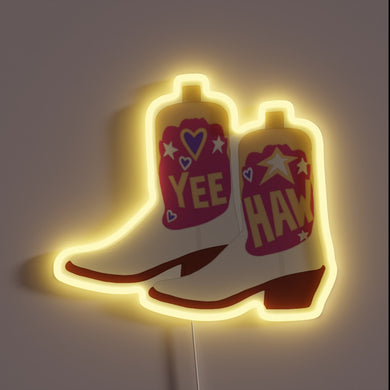 These vibrant neon cowboy boots shout “YEE HAW” in bold style — perfect for lighting up any western-themed space with playful attitude and country charm.