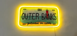 Le signe de néon brillant OBX original