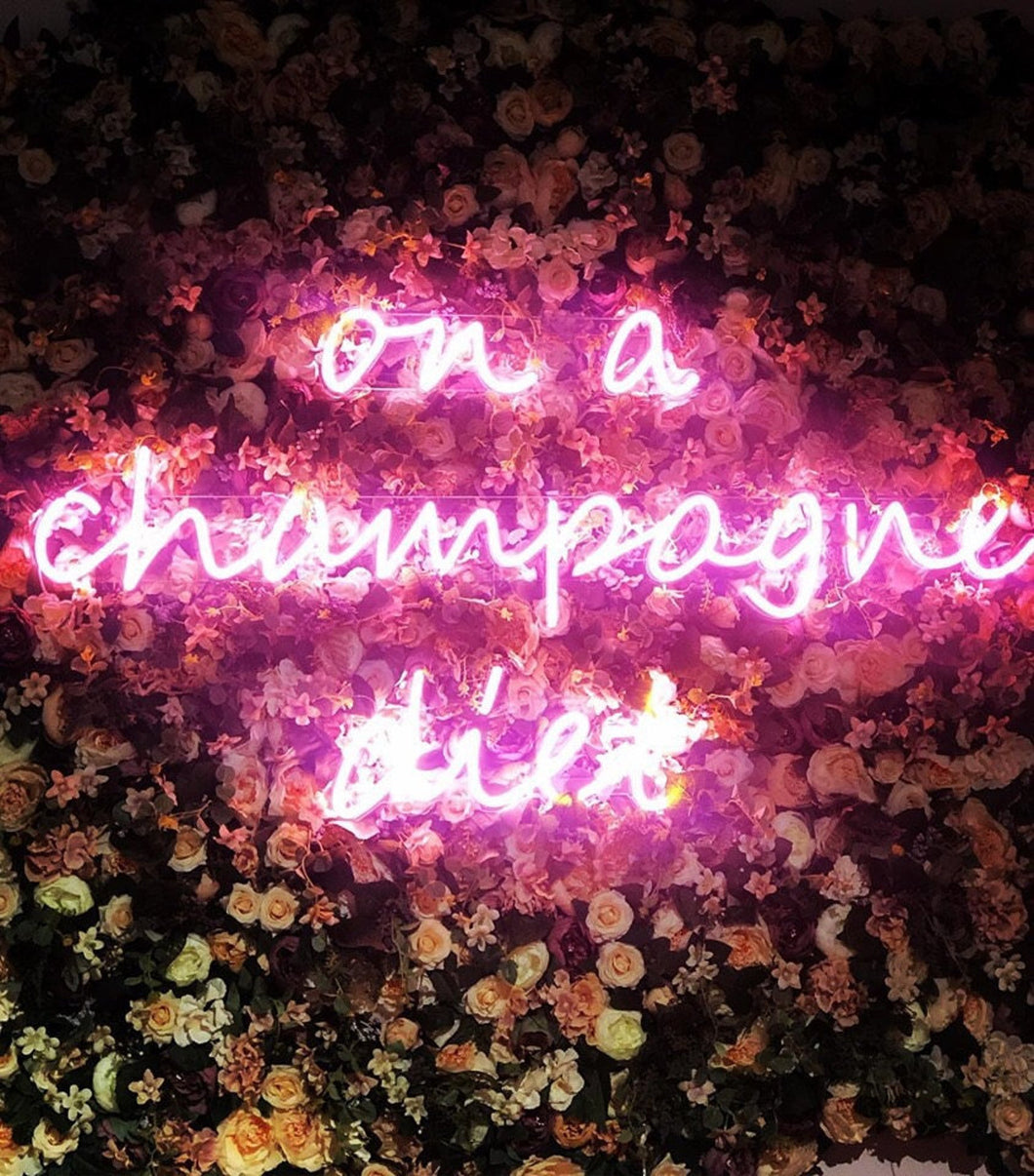 On a champagne diet - neon sign