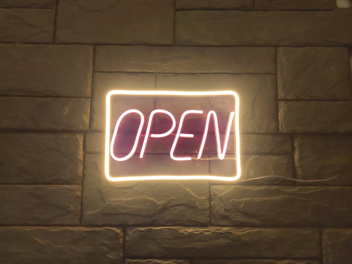 Open, Unbreakable Neon Sign